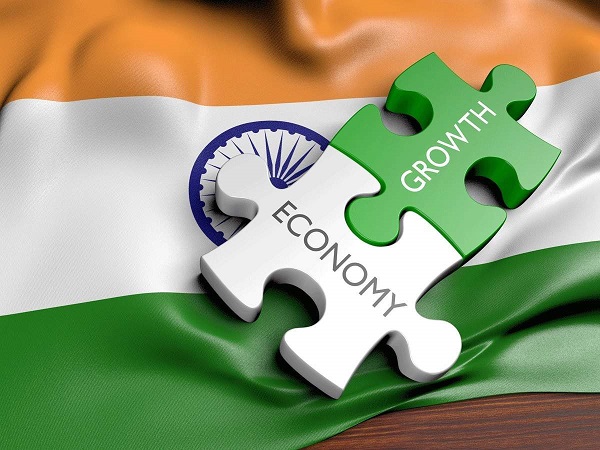 Indian Economy Growth Representing In The Jigsaw Puzzle Placed On The Indian Flag.
