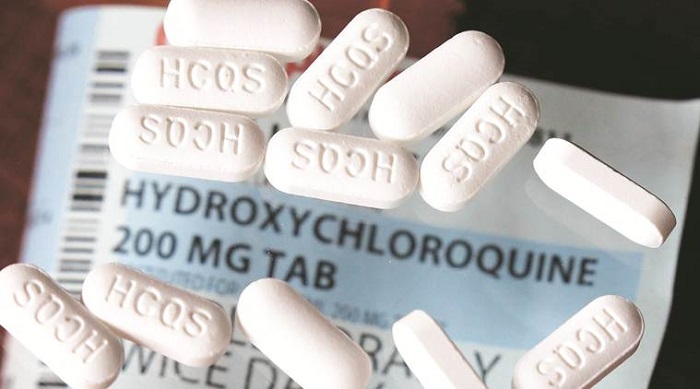 Hydroxychloroquine Capsules Placed On The Table.