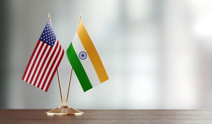 Indian And United States Table Flags Placed On The Table.