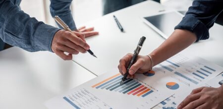 Business peoples discussing on business reports